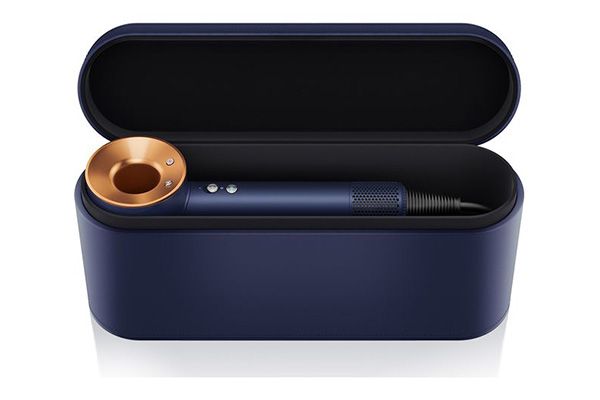 A Dyson Supersonic hairdryer in its limited edition Prussian Blue and Copper case.